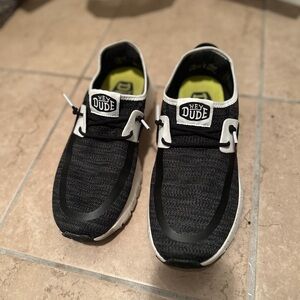 Hey Dude Black and White Slip-On Shoes Men’s size 8